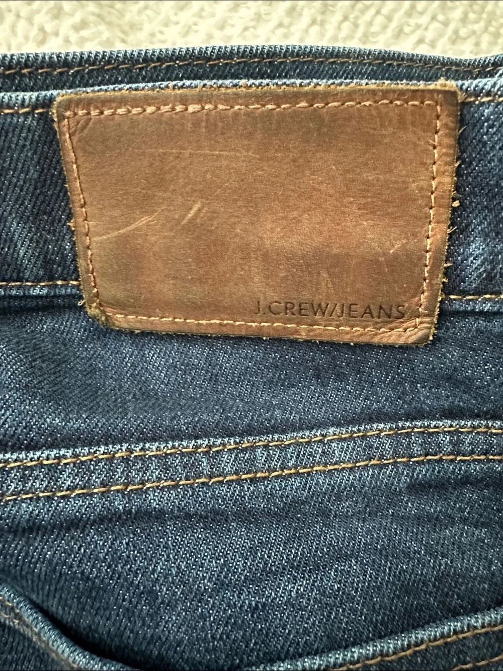 J. Crew Dark Blue Straight-Leg Jeans with Brown Patch